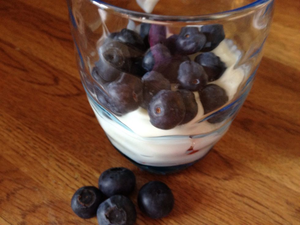 Place a handful of blueberries over the yogurt.