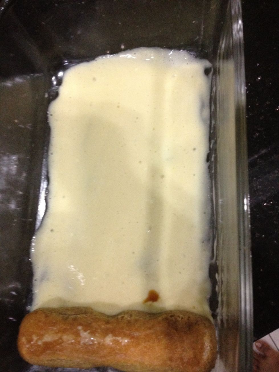 Place a little of your cream mixture on the bottom layer and start layering the biscuits.
