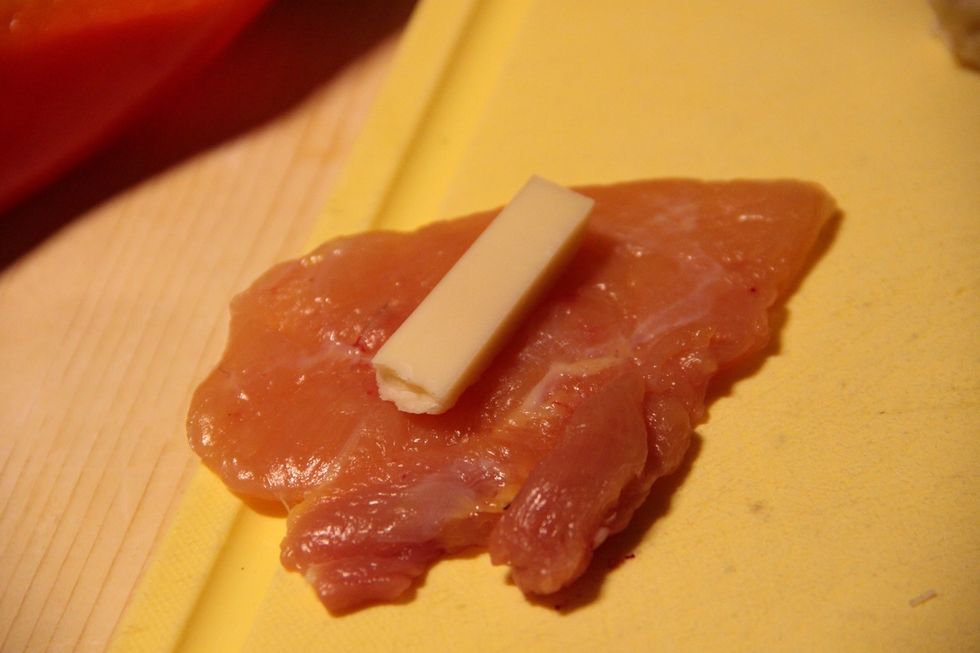 Place a long slice of provolone cheese in the center