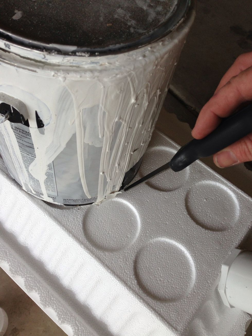 Place a paint can on the top (this can matched almost perfectly to my fan size) cut it like you are carving a pumpkin (at any angle to the top doesn't fall through)