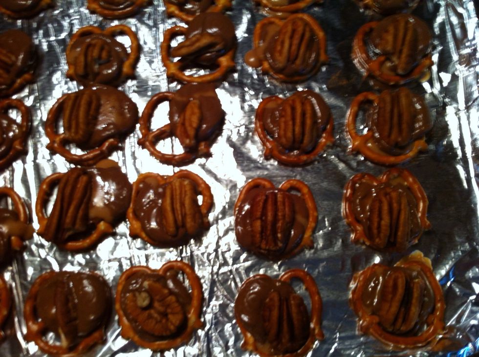 Place a pecan half on each.