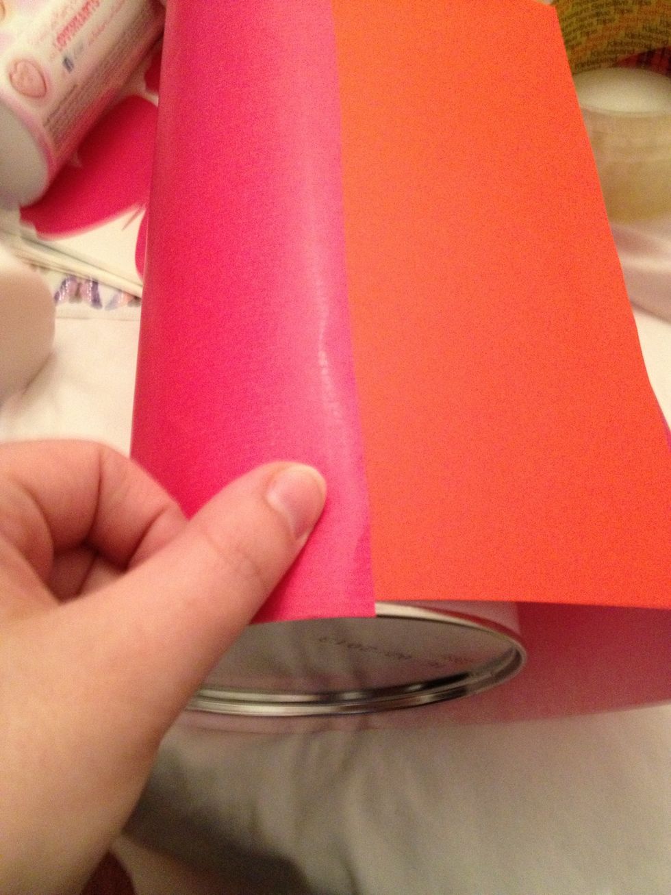 Place a piece of card under to block logo out