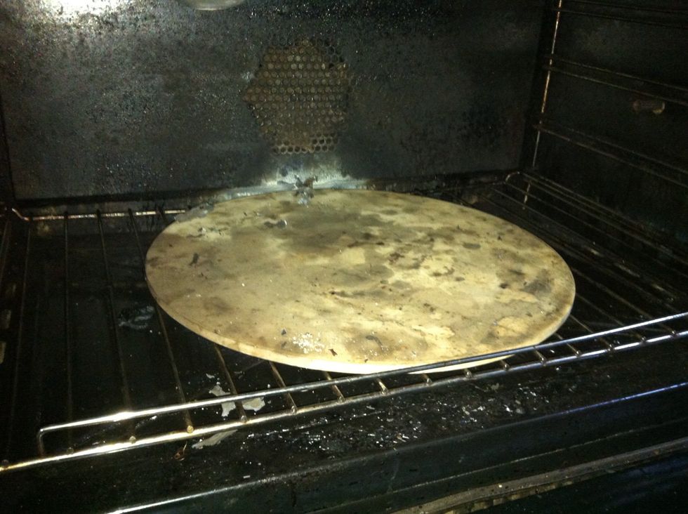 Place a pizza stone at the bottom rack and cranck up the heat to as far as your oven goes! (250 C for me )Pre heat the stone for a whole hour!