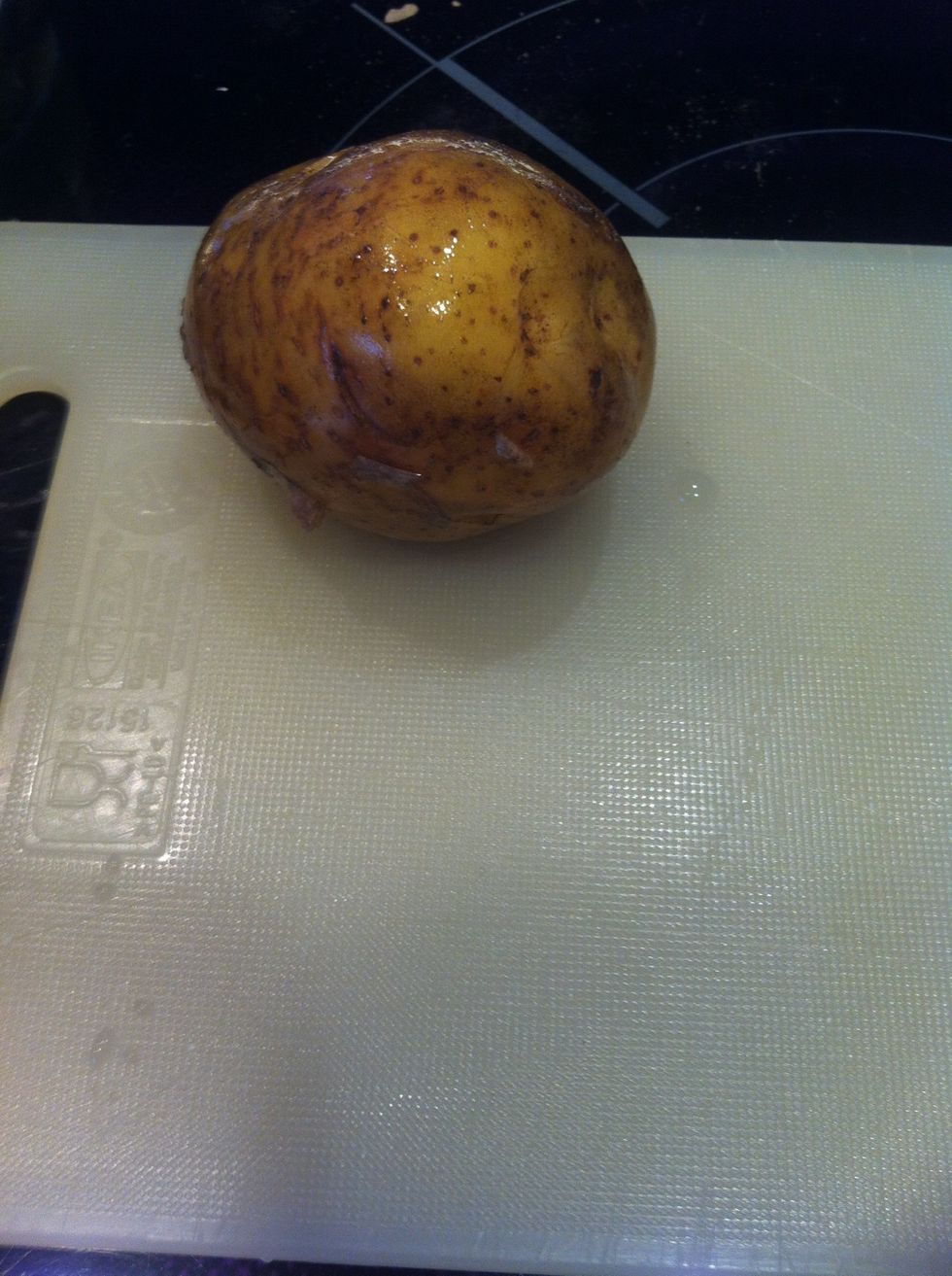 Place A potato on A cutting board
