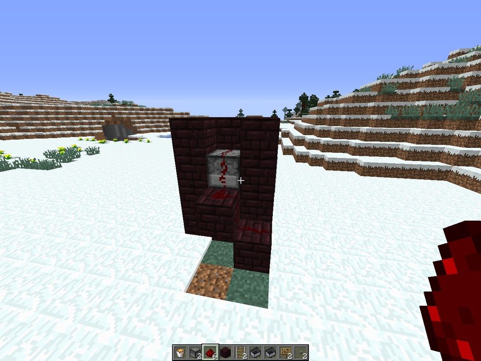 place a redstone dust on both sides like so