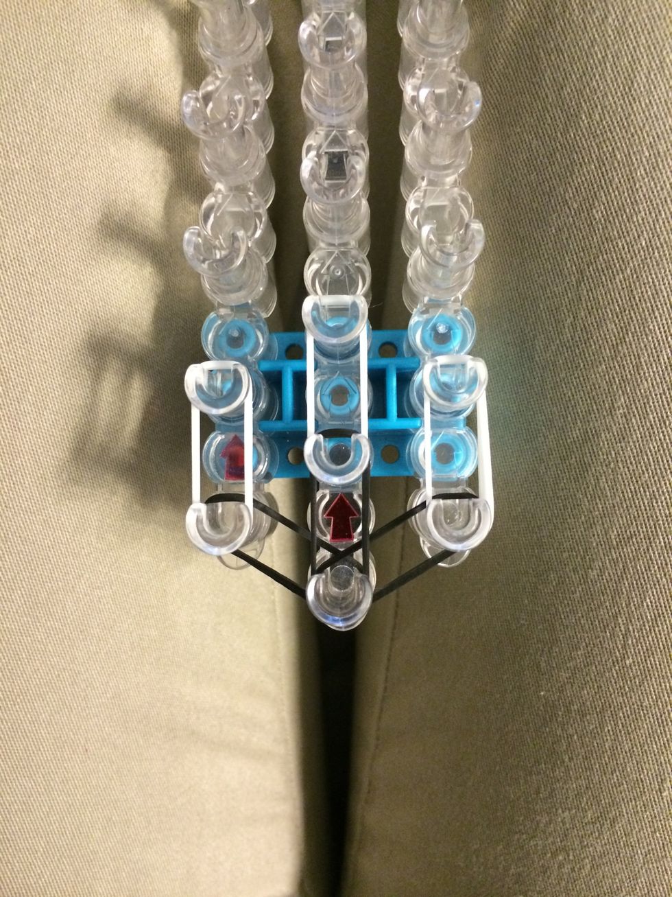 Place a row of white bands across the black. Each set will have 2 white bands.