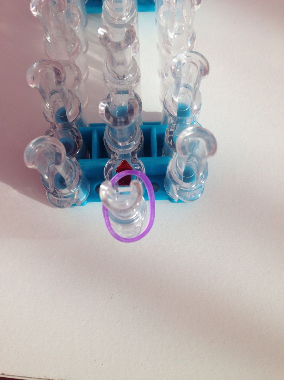 Place a rubber band in the middle.