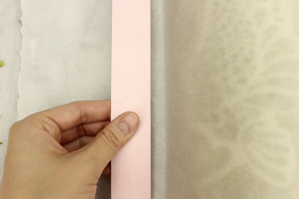 Place a ruler on top of the tab.