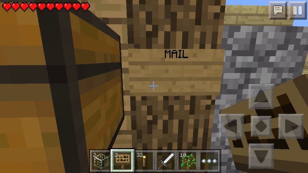 Place a sign that reads "MAIL"