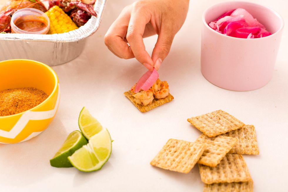 Place a slice of pickled red onion on top.