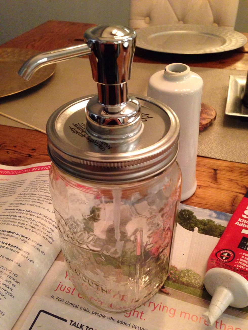 Place a small bead of caulk on the outside. Smooth the bead and excess caulk around the outside with your finger. Clean up anything on the lid with a paper towel. Let dry for 24 hours.