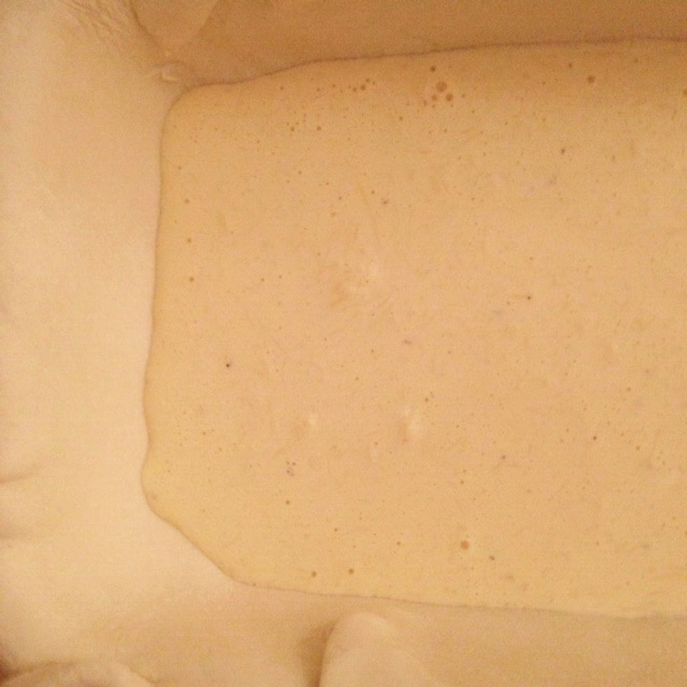 Place a small quantity of cream egg mix in the coated pan to form a base layer