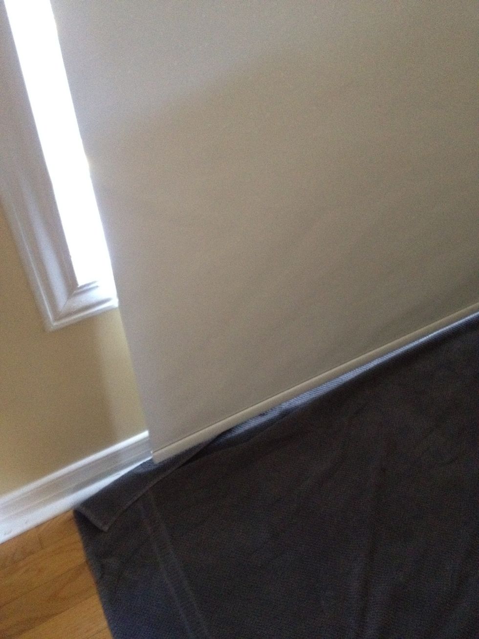 Place a towel on the floor to catch the drips. Now reinstall the blind and fully extend it. At this point you can let it dry on its own or wipe it with a towel instead.