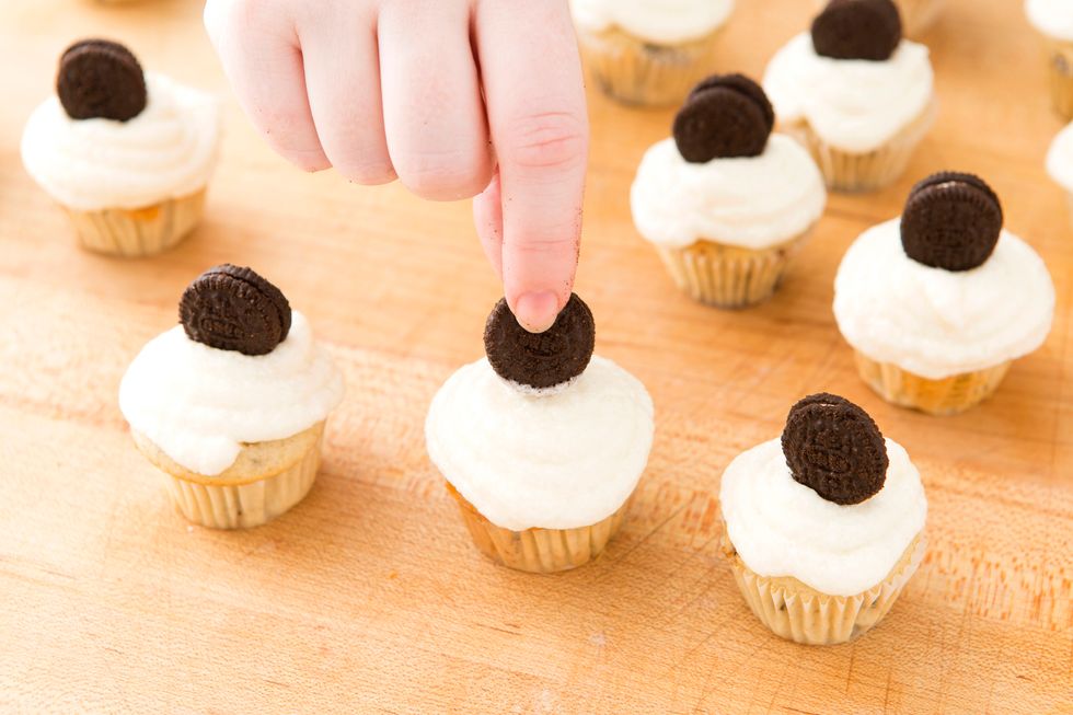 Place a whole mini Oreo in the top of your cupcake to decorate and enjoy!
