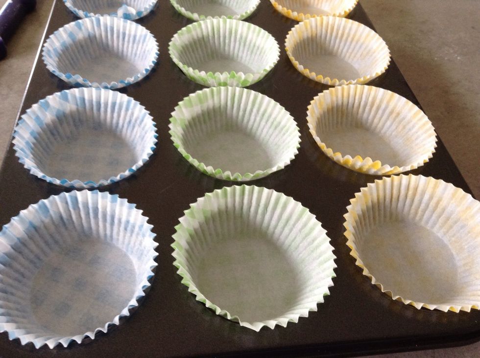 Place about 20 muffin case into a muffin tray