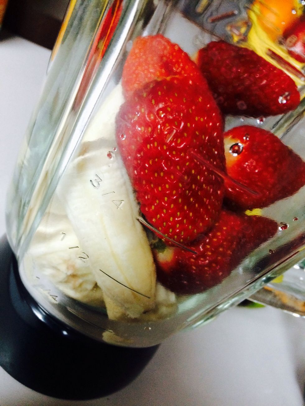 Place all fruit in the blender
