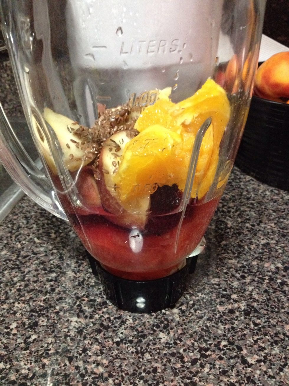 Place all ingredients in a blender. Ice cubes not shown. Use as many cubes as you'd like, I used 4. Blend, blend, blend.