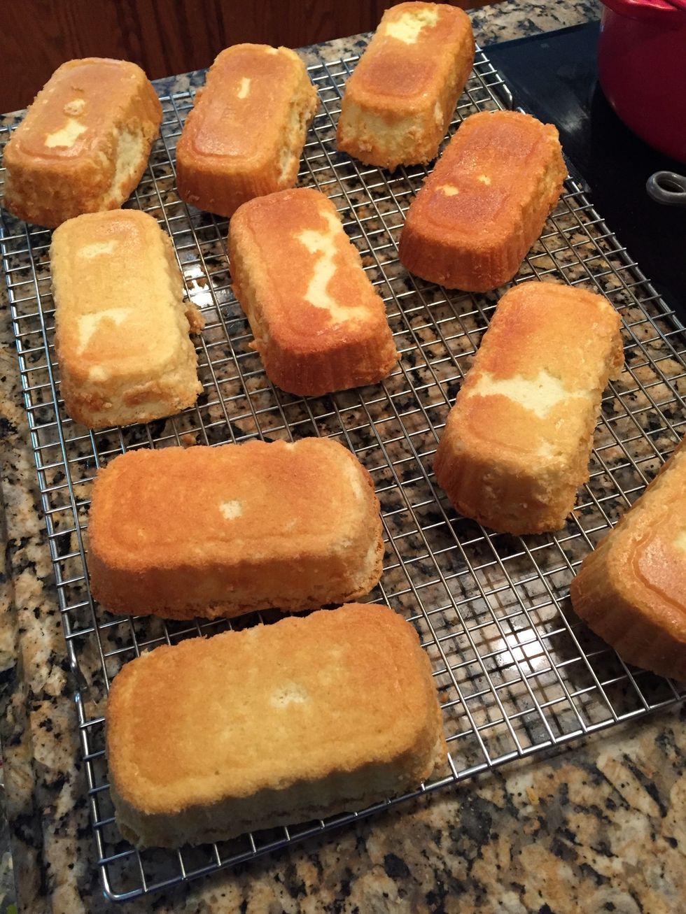 Place all loaves on their tops (down side up) because you will glaze them this way