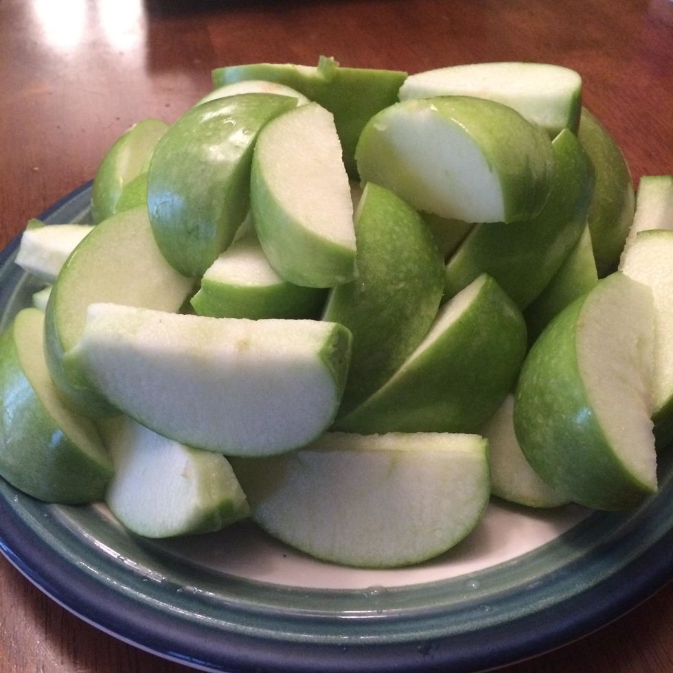 Place all of the apple slices onto a plate.