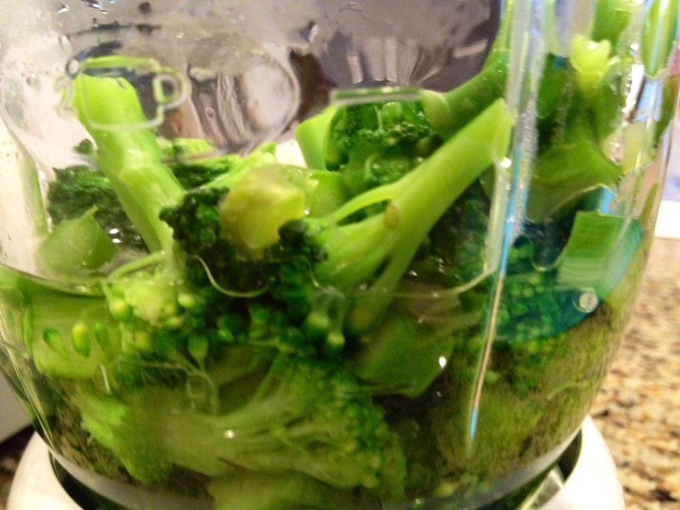 Place all of the blanched vegetables into your blender with the salted hot water and blend until a smooth texture.