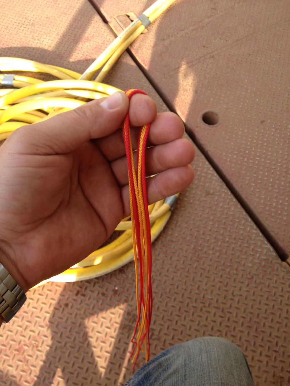 Place all pieces of line over your finger doubled up so you have 8 even tail ends.