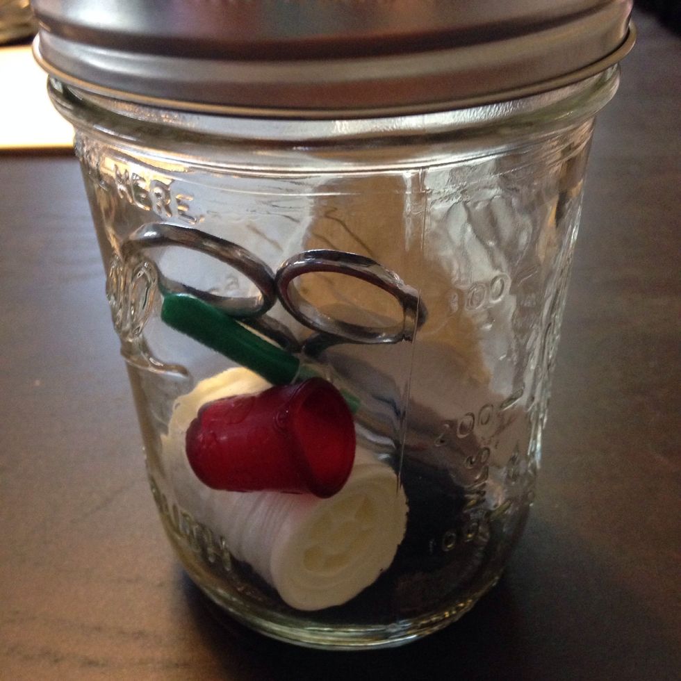 Place all the sewing supplies inside and screw on the lid
