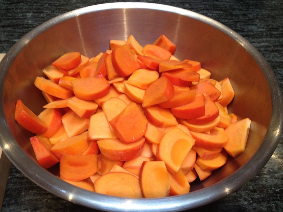 Place all the sliced wedges into a large bowl.