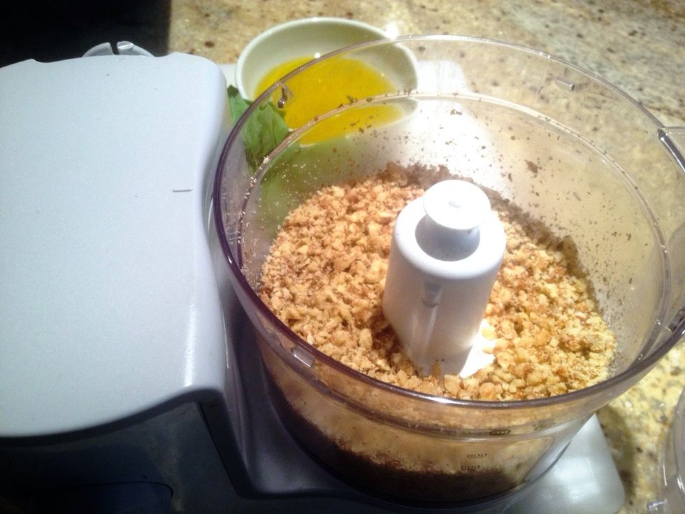 Place all the walnuts in the food processor and blend until they're a rough texture, you don't want this too smooth.