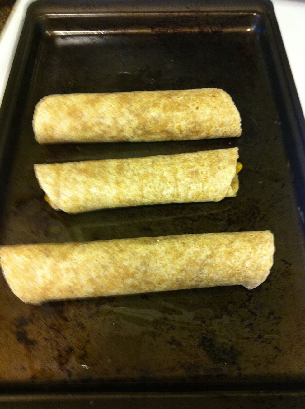 Place all three on a baking sheet that's coated with cooking spray and coat the taquitos with cooking spray. Bake until golden brown, about 10 mins.