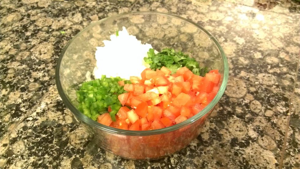 Place all vegetables in a bowl.