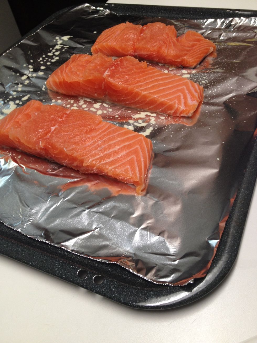 Place aluminum foil on baking sheet and spray with a nonstick cooking oil. Arrange your fillets on baking sheet and sprinkle with salt and pepper.