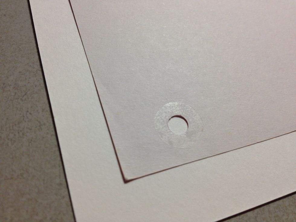 Place an enforcement ring at the back of the paper. The last thing you want is for your card to tear if your friend pulls it out from a massive pile next time.