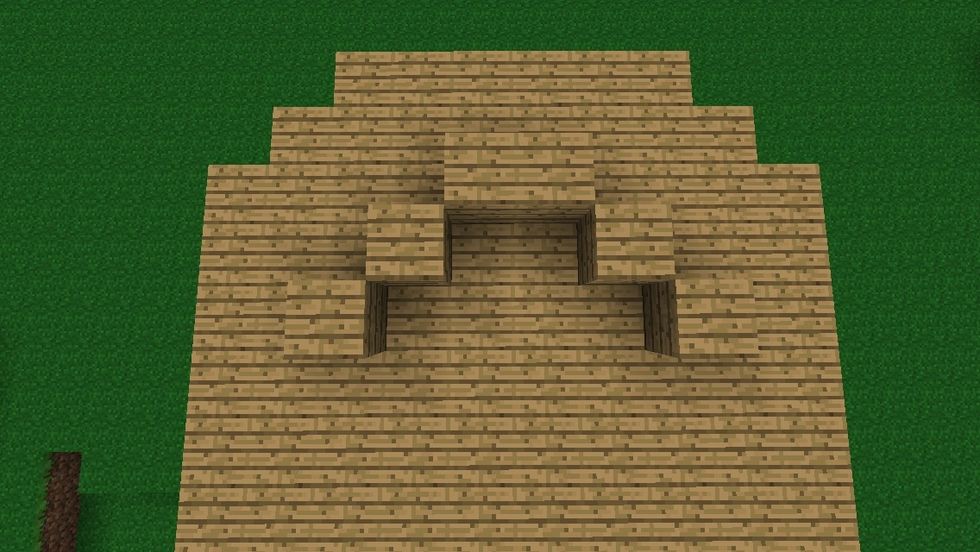 Place another block diagonally from the last block.