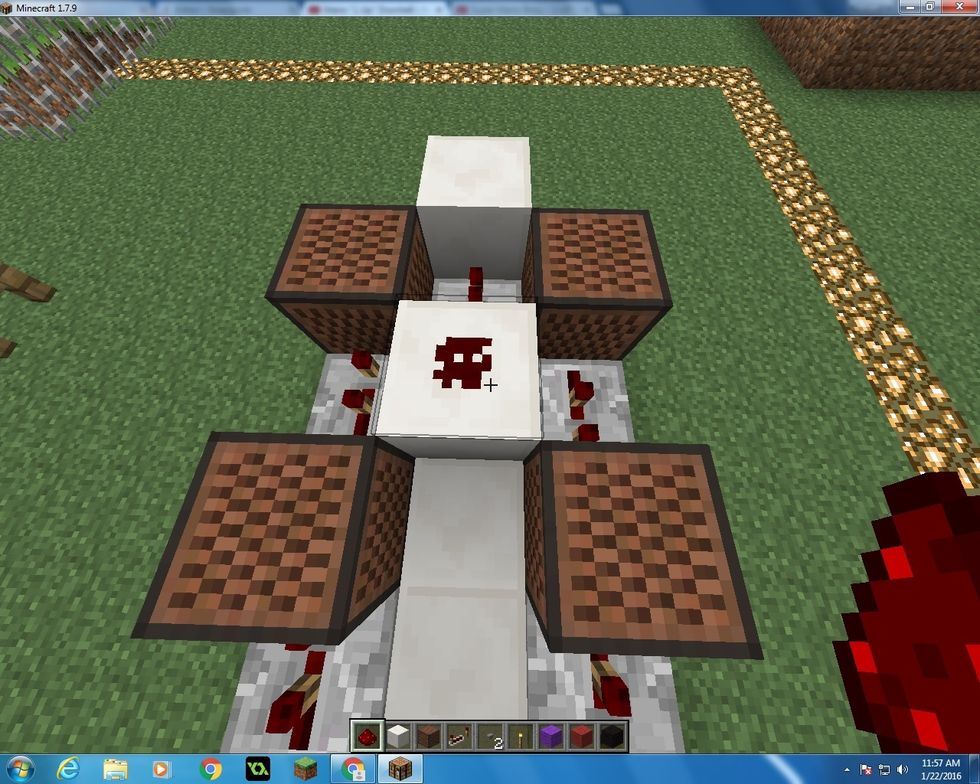 Place another block of Quartz in front of the Repeater you just put down. On that block place another Redstone.