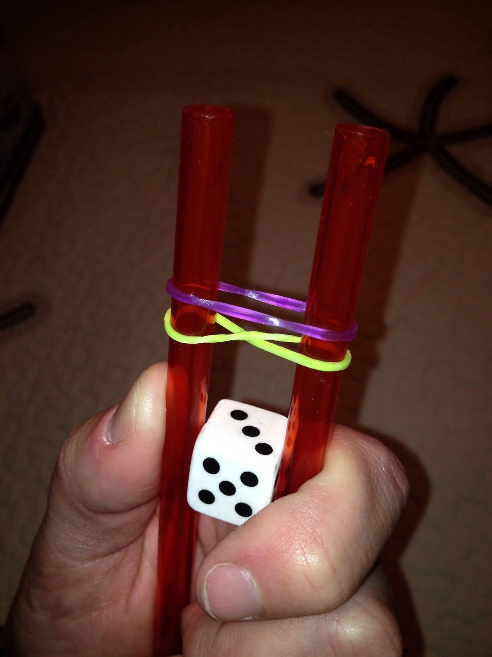 Place another elastic on top.