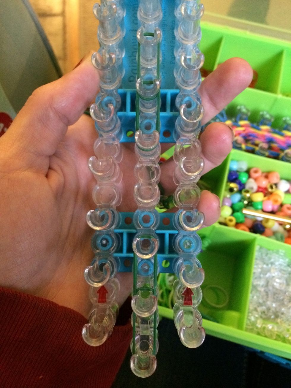Place another green one below the third green one. Make sure you do it below and not on top of it.