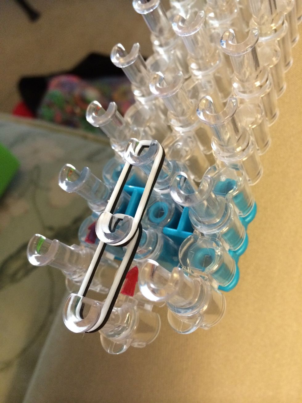 Place another white and black band