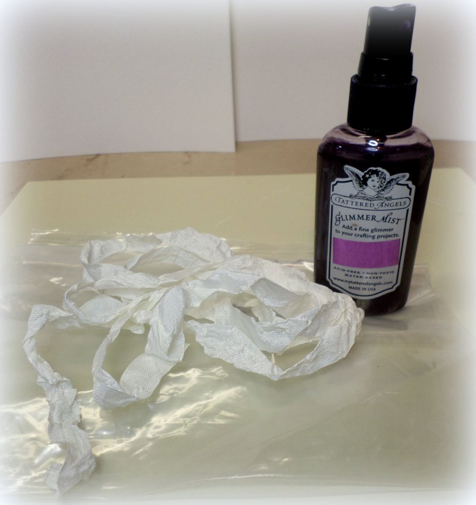 Place approx. 3 yards of seam binding in a plastic zip closure bag. Spray ink into the bag. Leave air in the bag and close it.