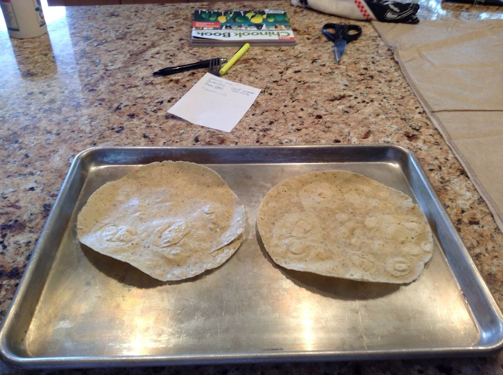 Place as many tortillas as you want on a tray. Make sure they are about an inch apart.