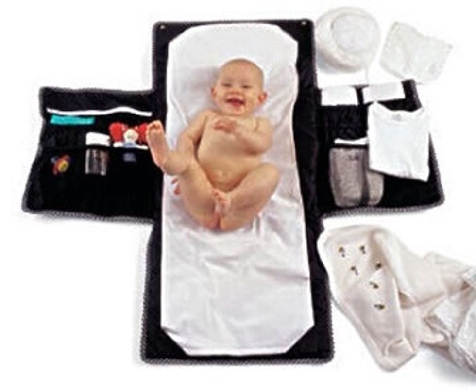 Place baby on safe changing area, if they are on a changing table DON'T leave them unattended! Remove clothing and dirty diaper, then compact the diaper and use tabs to hold together to keep mess in!