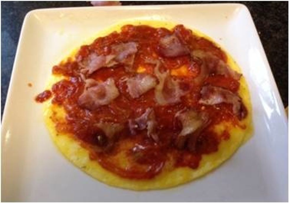 Place bacon strips onto the tomato sauce base