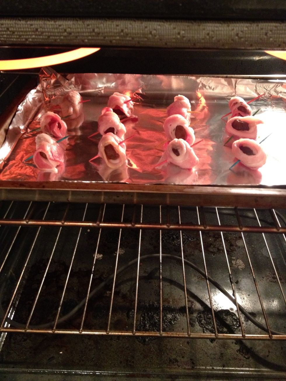 Place bacon wrapped chestnuts in the oven and broil until they start to brown.