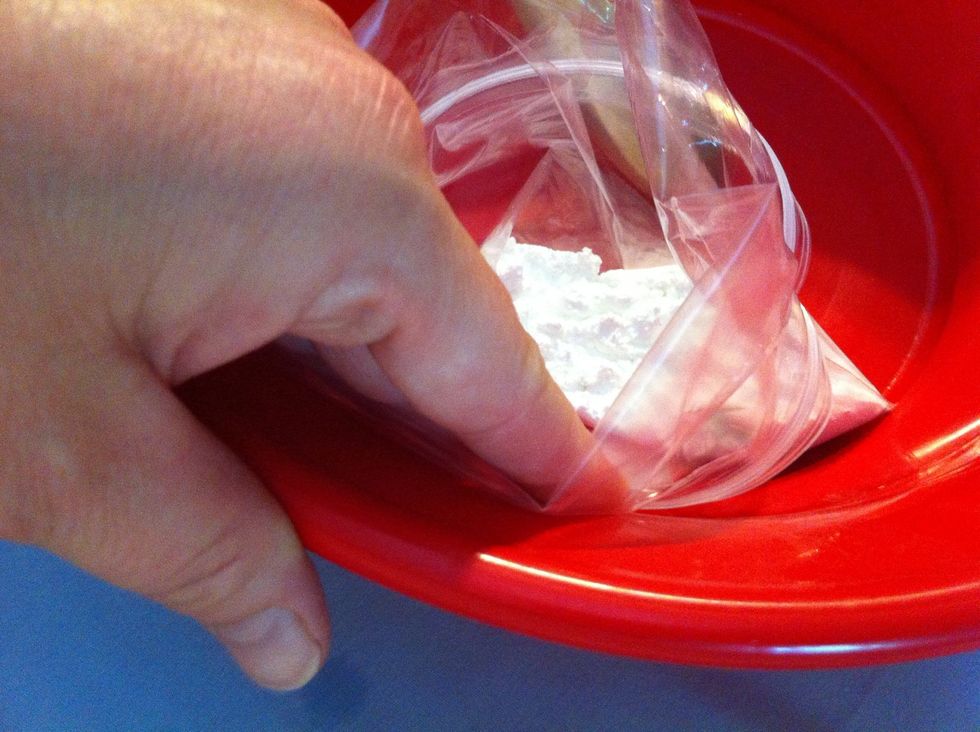 Place bag against tape. Now your Ms Kay is ready to pinch some in her hand and blow it like Ms Kay does on the show.