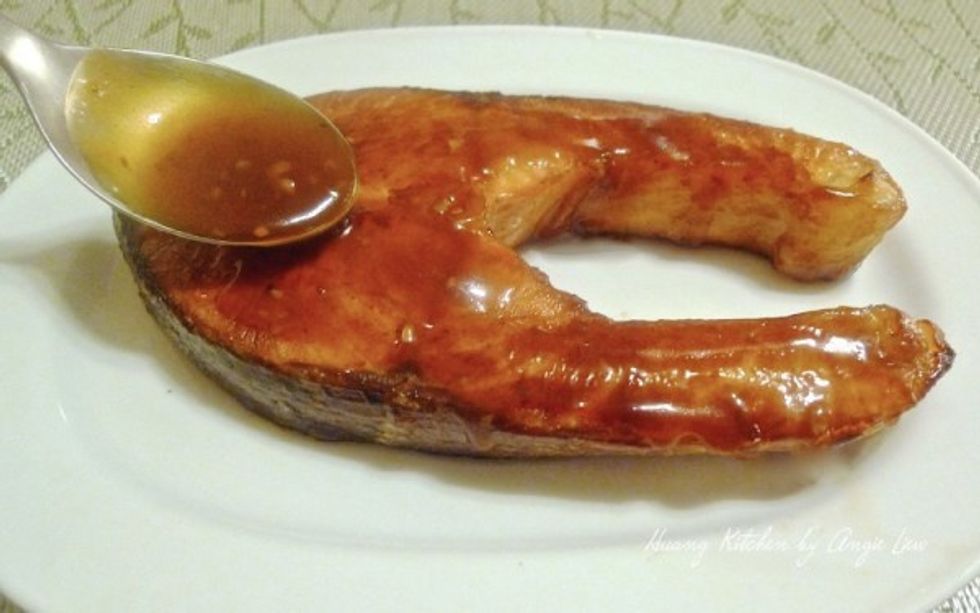 Place baked salmon on serving plate. Pour glaze over it.