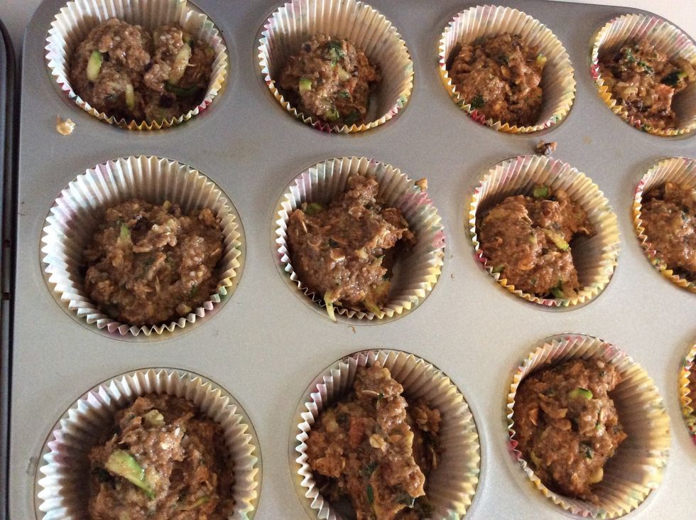 Place batter in baking cups.