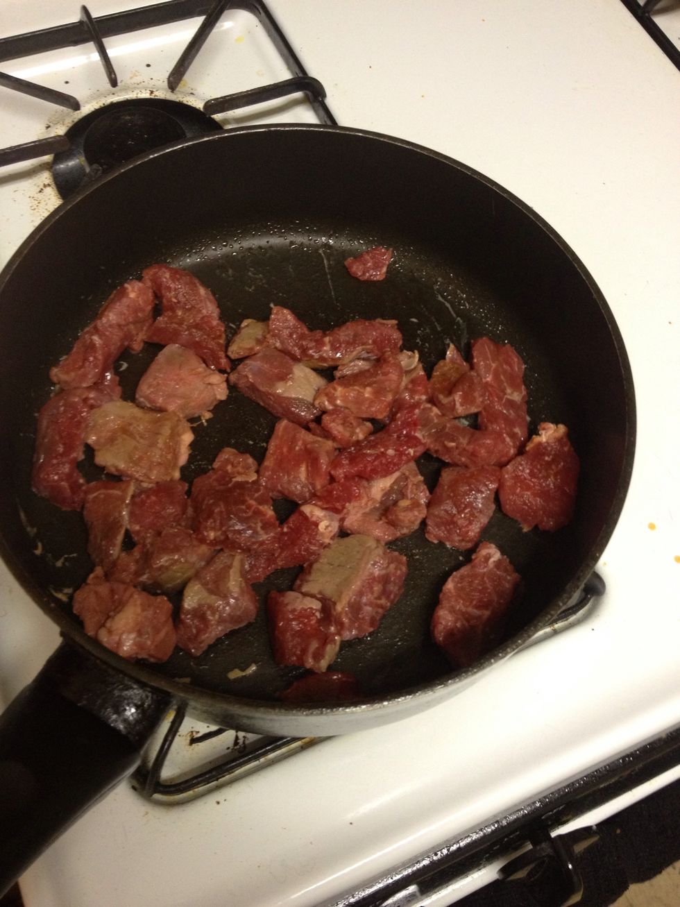 Place beef tips in the skillet. I split up my tips so that I could have enough room to move them around the pan with the spatula, but if you have a large enough skillet you can put them all in at once
