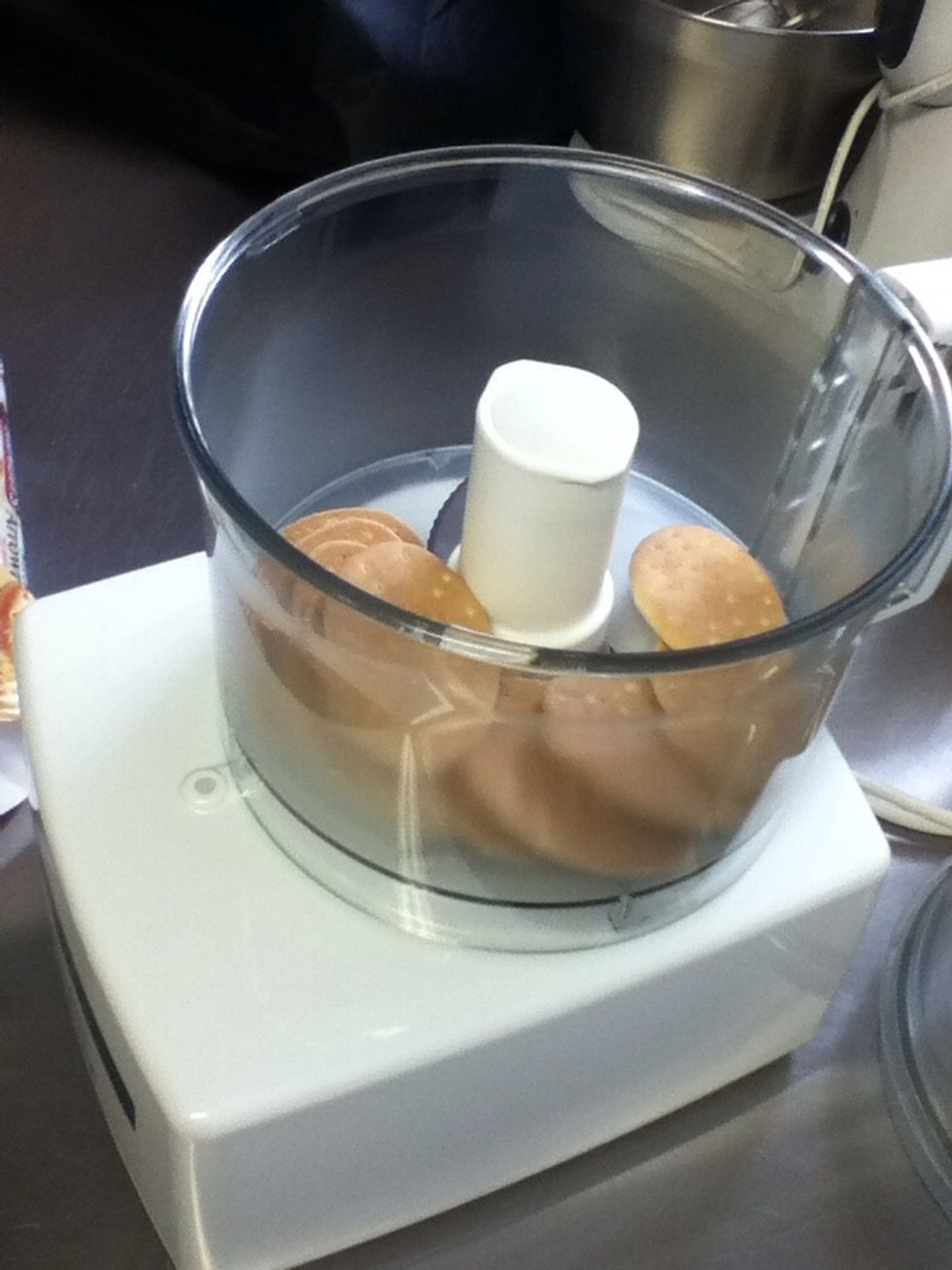 Place biscuits in food processor
