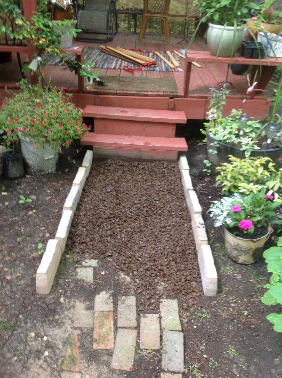 Place blocks and fill path with rubber mulch. Do not skimp and buy regular mulch. The rubber mulch will not break down, and is springy underfoot...fun.