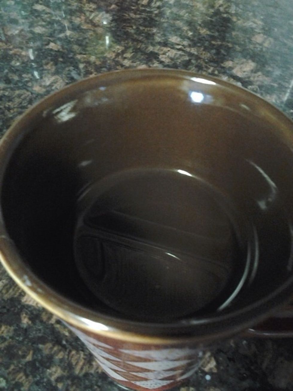 Place boiling water in a cup.