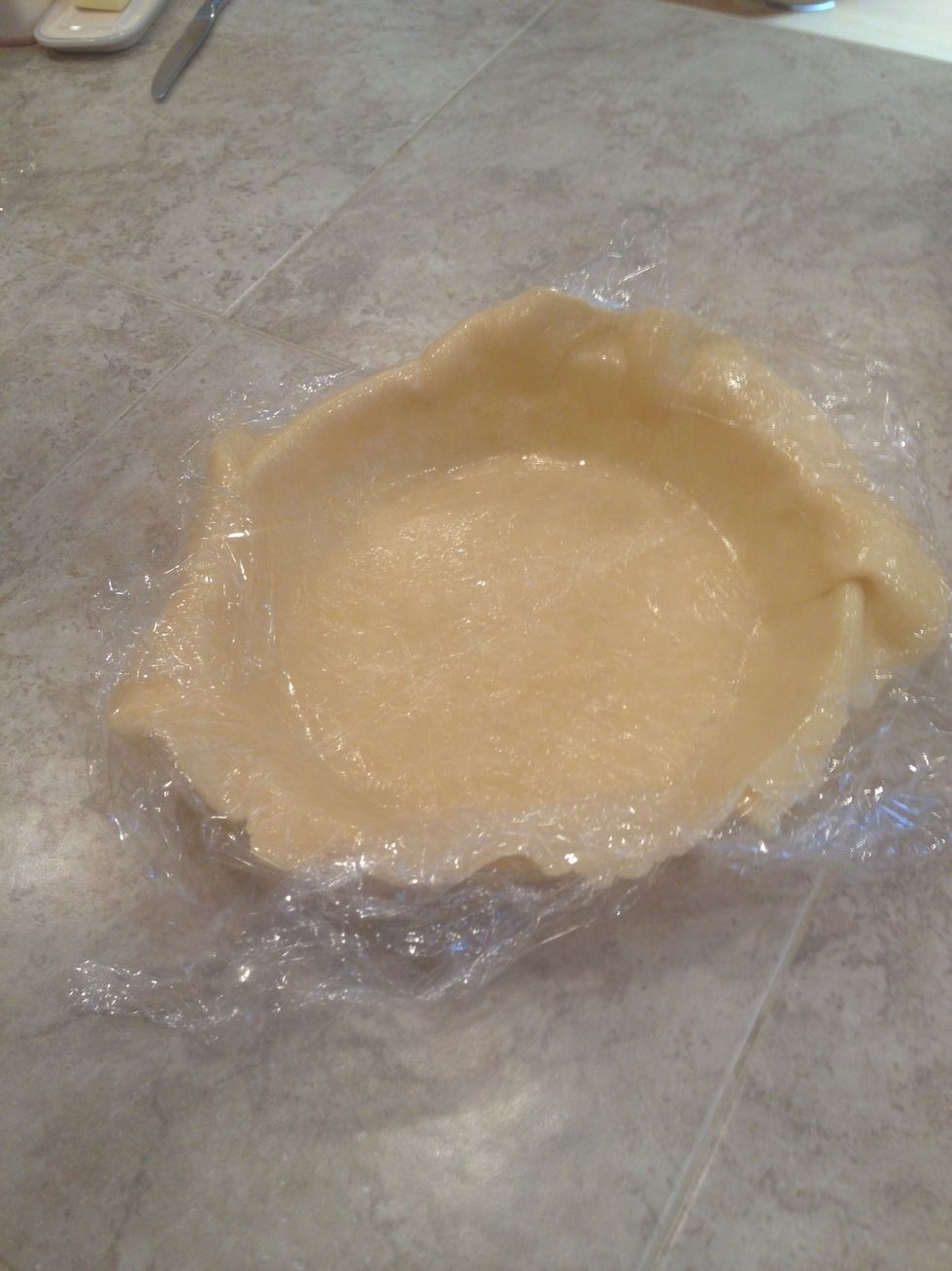 Place bottom crust in pie pan.